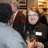 Women talking over drinks